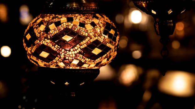 Traditional handmade Turkish lamps in souvenir shop. Mosaic of colored glass. Lamps Orientals au Grand Bazar d'Istanbul Turquie