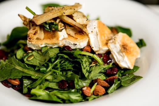 Salad of roast and tasty goat cheese