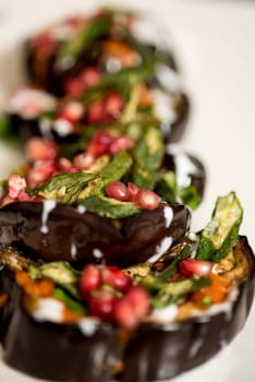 Close up of aubergine stuffed with vegetables