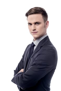 Sideways of confident businessman over white