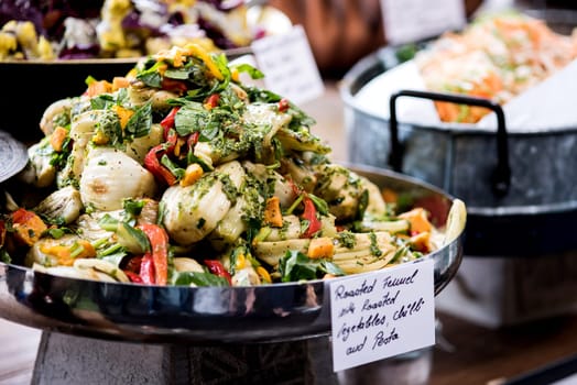 Assorted fresh salads displayed on a buffet
