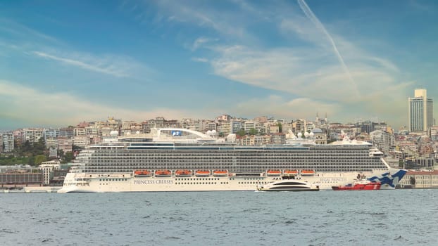 Regal Princess, Huge cruise ship docked at terminal of Galataport, along shore of Bosphorus strait, in Karakoy district, Istanbul, Turkey