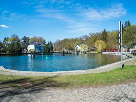 Woltersdorf, Germany - April 17, 2022: Jetty basin with adjacent tourist restaurants at the Woltersdorfer Schleuse in the direction of Kalksee.