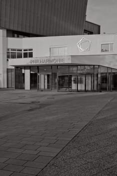 Vertical black and white shot of the entrance of the Berlin Philharmonic Hall
