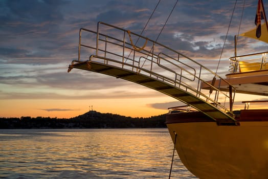 bridge of a private luxury ship at sibenik in golden light
