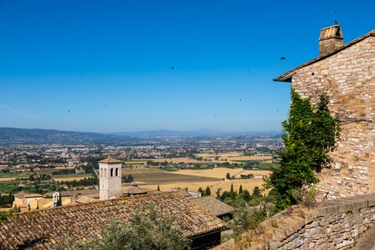 Assisi village in Umbria region, Italy. The town is famous for the most important Italian St. Francis Basilica (Basilica di San Francesco)