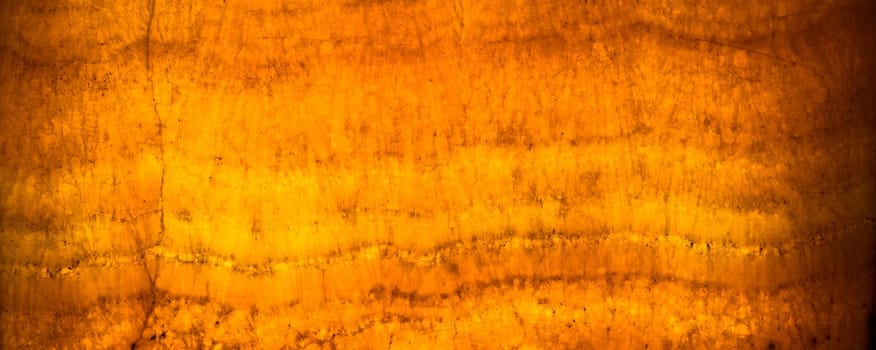 Architectural detail of an antique alabaster stone sheet. Alabaster is translucent enough to be used for small windows. It was used for this purpose in Byzantine churches. Image useful for an elegant background.