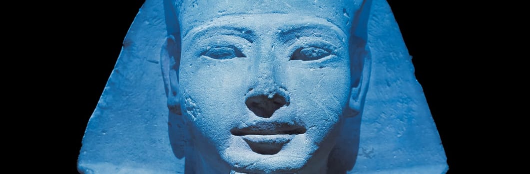 Egyptian archaeology. Ancient Sphinx in blue representing the pharaoh, copy space