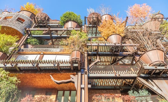 Turin, Italy - Circa November 2021: real estate green residential building. Exterior with modern design, plants and wood integrated. This Treehouse Suite is named 25 Verde
