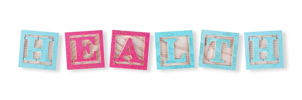 A health concept with childs wood blocks on white with clipping path to remove shadow