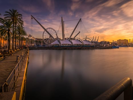 Genoa, Italy - 06 06 2021: Porto Antico Old Port at sunset in Genoa in Italy. Long Exposure.