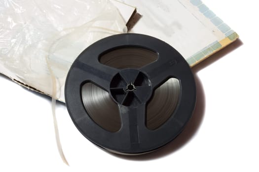 reel-to-reel tape spool with carton box on white background