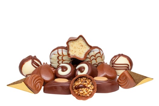 Chocolate candies collection. Beautifully assortment of various chocolate candies sweets isolated of a white background. Clipping path. Macro.
