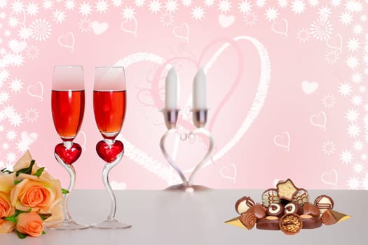 Happy Valentines or Mothers Day card. Two glasses of champagner, a bouquet flowers and a pile of chocolate candies on table over abstract heart background. Space.