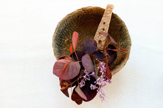 The plan view and the still life of a singing bowl with a dry bouquet.