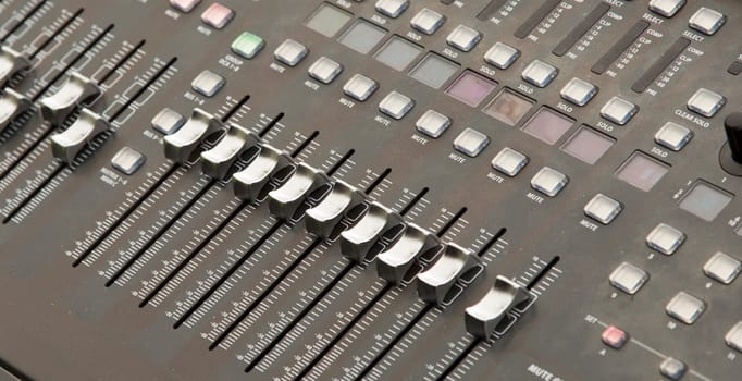 Mixing Panel Close Up with lots of buttons.