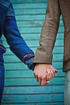Hands of young couple in casualwear