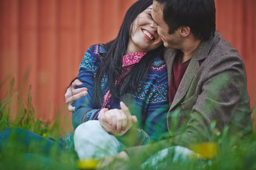 Young man embracing his girlfriend