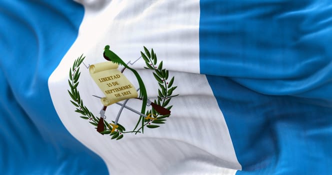 Close-up view of the Guatemala national flag waving in the wind. The Republic of Guatemala is a State of Central America. Fabric textured background. Selective focus. Realistic 3d illustration