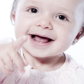 little children portraits taken in the studio on a white background