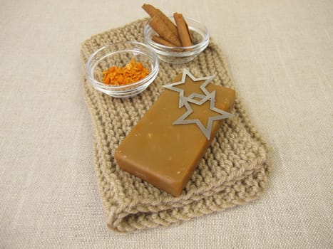Natural soap bar with Christmas scent of cinnamon and orange peel