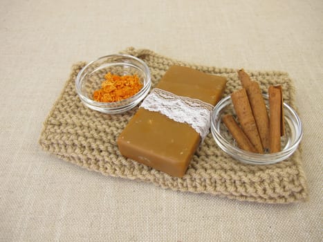 Natural soap bar with Christmas scent of cinnamon and orange peel