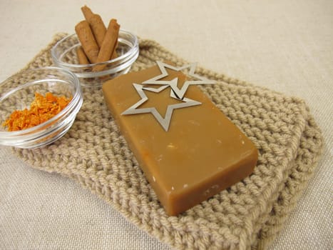 Natural soap bar with Christmas scent of cinnamon and orange peel