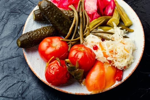 Set salted vegetable pickles, spicy pickled on a plate. Canned food