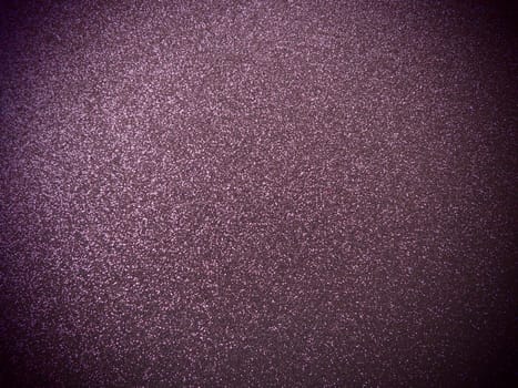 Purple shiny bokeh abstract background. Blue - lilac paper with sparkles. Festive backdrop.
