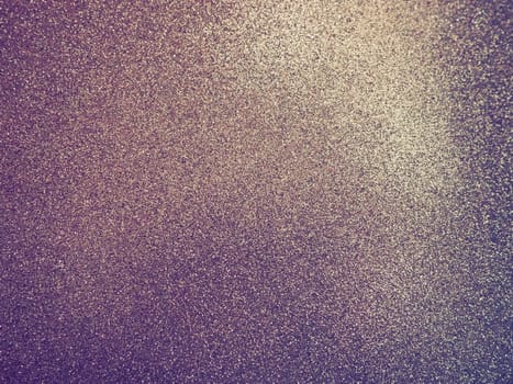 Purple - yellow shiny bokeh abstract background. Blue - lilac -pink paper with sparkles. Festive backdrop.