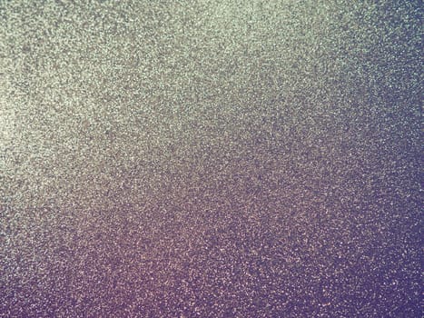 Purple - yellow shiny bokeh abstract background. Blue - lilac -pink paper with sparkles. Festive backdrop.