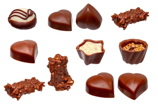 Chocolate candies collection. Set of a beautifully assortment of various chocolate candies sweets isolated on a white background. Macro. Christmas or other holidays.
