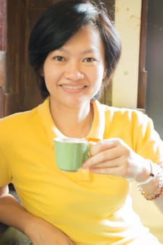 Customer enjoying hot espresso shot, stock photo