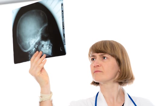 young female doctor with X-ray photograph in front of white background