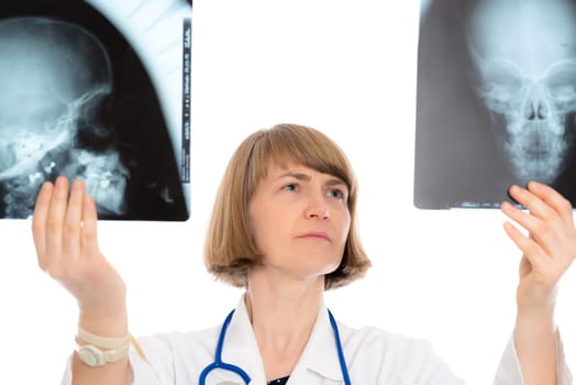 young female doctor with X-ray photograph in front of white background