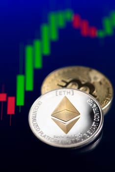 Bitcoin and cryptocurrency investing concept. Bitcoin and ethereum cryptocurrency coins. Trading on the cryptocurrency exchange. Trends in bitcoin exchange rates. Rise and fall charts of bitcoin and altcoin.