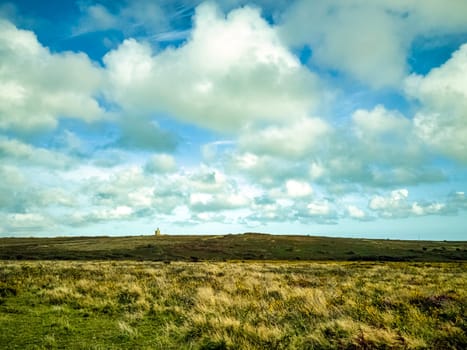 Cornish view with abandoned Greenburrow Pumping Engine House (Ding Dong Mine) in background - Cornwall, United Kingdom
