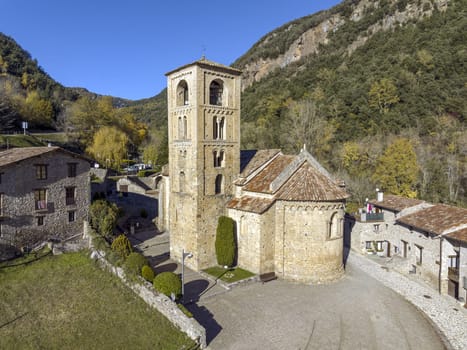 View of the bell tower and the apse of the Romanesque church of Beget,  of Sant Cristofol (12th Century )  Spain