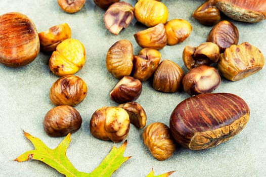 Peeled roasted chestnuts, appetizing dessert. Caramelized roasted chestnuts. Close up