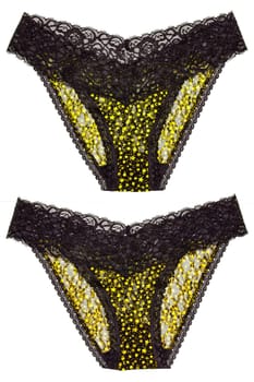 Underwear woman isolated. Set of luxurious elegant black lace thongs panties with colorful yellow stars pattern isolated. Clipping path. Macro. Underwear fashion.Two views.