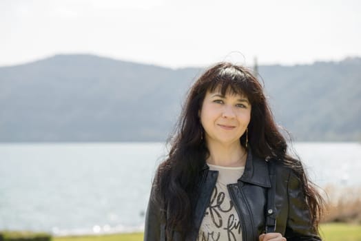 Portrait of a girl at castel Gandolfo Lake, a little town near Rome Italy