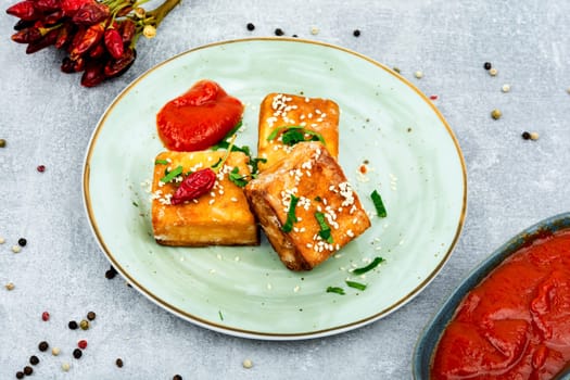 Roasted tofu cheese on sticks. Vegetarian food, space for text
