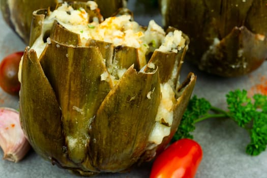 Delicious appetizer roasted artichokes cooked with cheese.