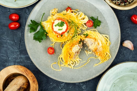 Tasty nest of spaghetti with tomato.Pasta spaghetti with meatballs