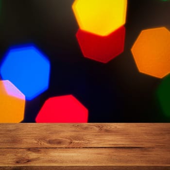 The background is an empty wooden board and a wall of blurred bokeh lights. For product demonstrations, free space, layout, mockup, perspective board, background board.