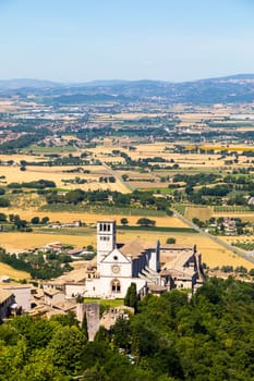 Assisi village in Umbria region, Italy. The town is famous for the most important Italian St. Francis Basilica (Basilica di San Francesco)