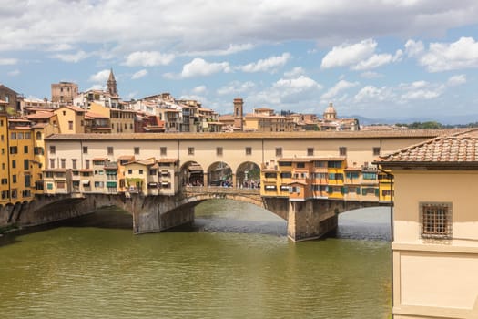 Florence, Italy - Circa June 2021: city landscape with Old Bridge - Ponte Vecchio