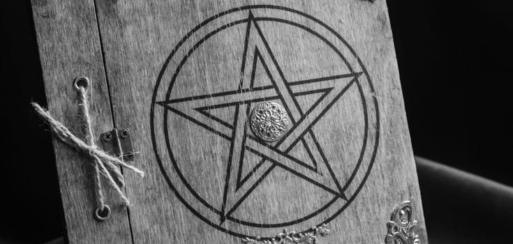 Old book of black magic. Concept for mystery, fantasy, dark evil