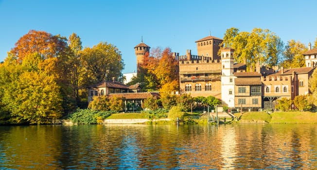 Turin, Italy - Circa November 2021: outdoors panorama with scenic Turin Valentino castle at sunrise in autumn