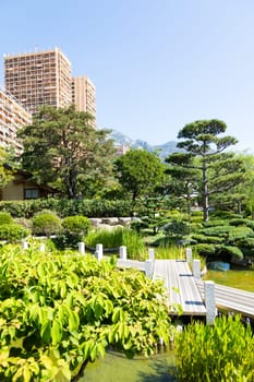 Monte Carlo - August 2022: Japanese garden with the city in the background